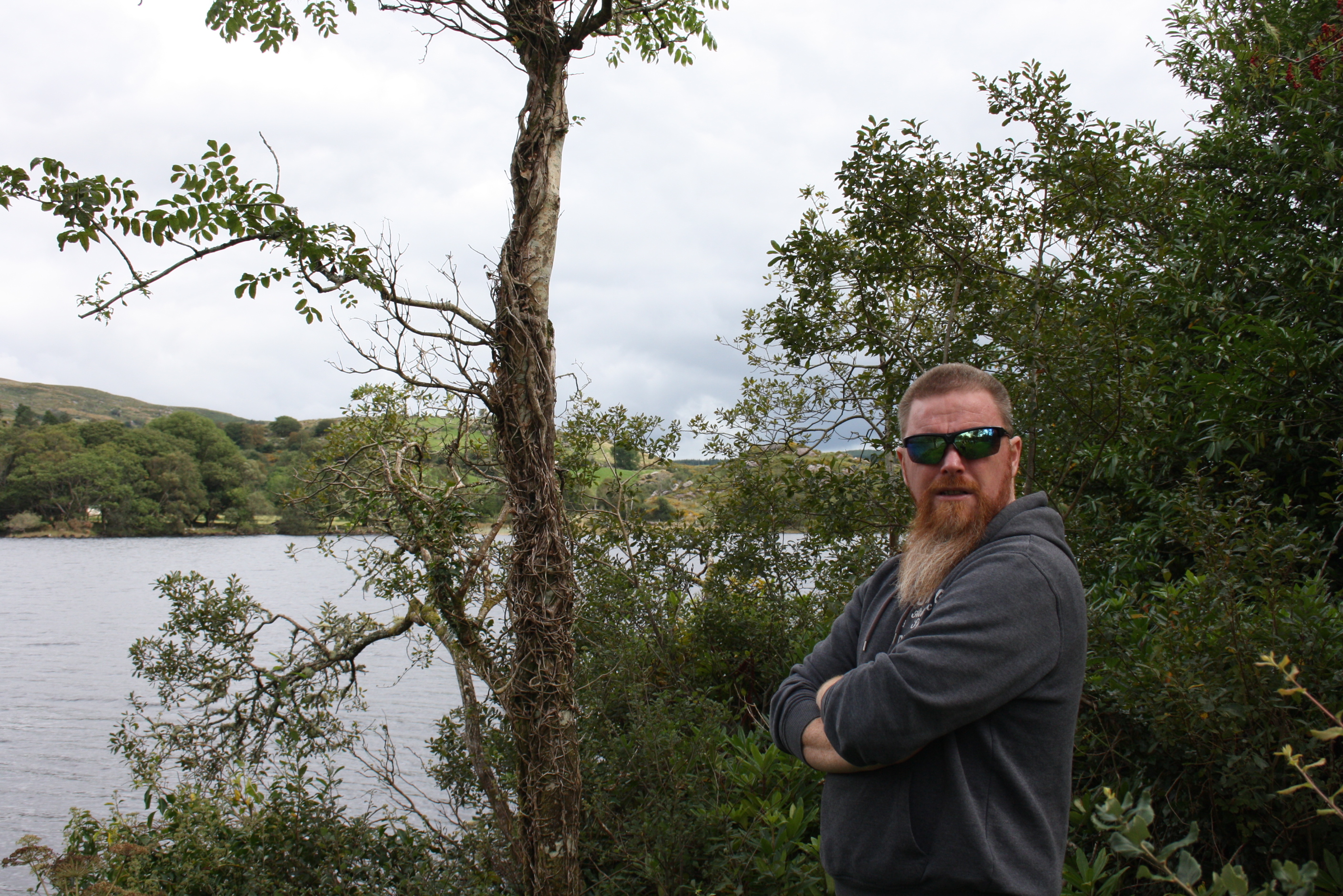 Barry Kavanagh by lake and hills